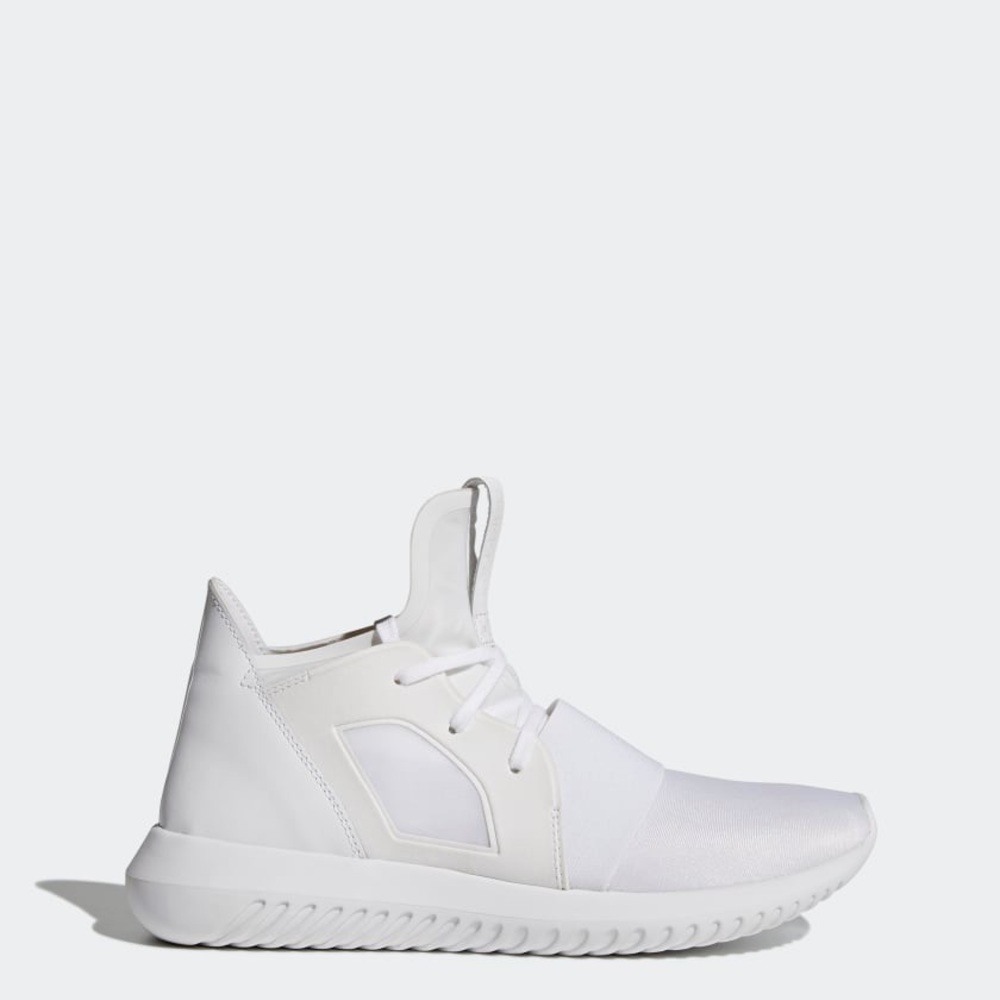 Women’s all the white Adidas tubular‘s